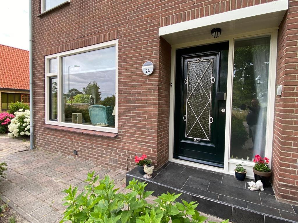 Huis Bij Het Water Met Sloepje Jutrijp Exterior photo